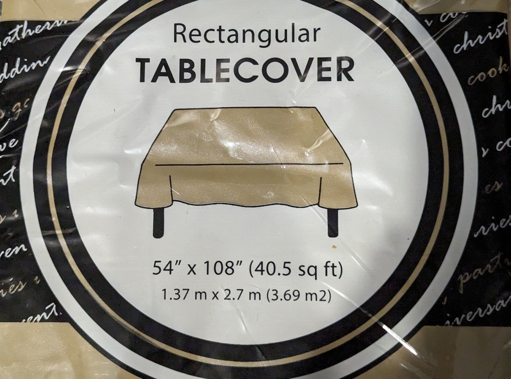 Two rectangular plastic disposable table cloths  54"x 108"  gold color.